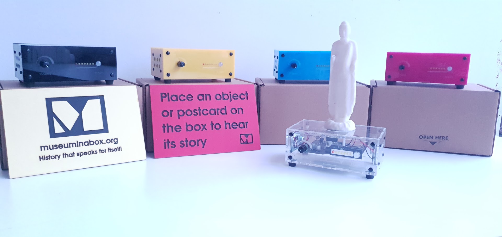 A display of Museum in a Box in a variety of colours